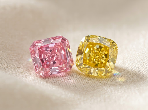 Loose fancy pink and yellow diamonds